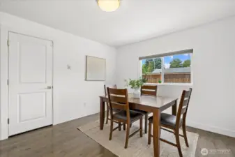 Spacious Dining Area with Functional Flow to Kitchen and Garage.
