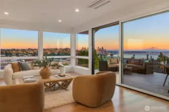 Unique reverse floor plan, with top floor great room, expansive windows and large slider leading out to panaramic view deck.