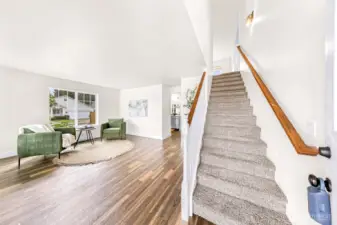 Bright entry opens up to Living Room