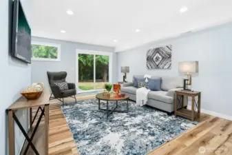 Spacious family room or 4th bedroom on the lower level with custom window trim