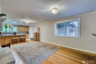 From entry looking into the secondary living space or formal dining room looking into the kitchen