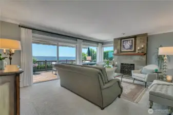 Relax by the fire in the bright living room