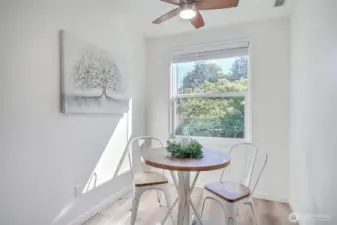 Nook with new ceiling fan. Windows on both sides of condo for great natural light.