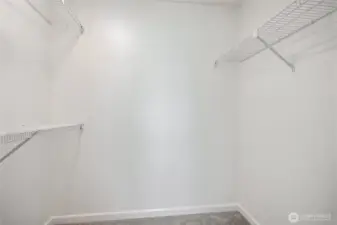 Primary walk-in closet.
