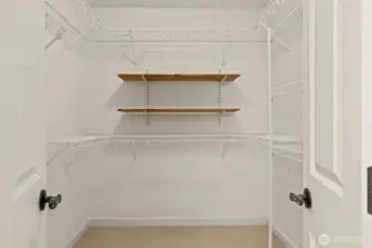 Primary walk-in closet.
