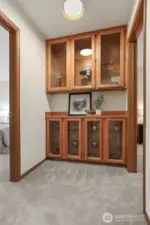 Upper level built-in-wall hutch.