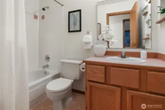 Ceramic upper level hall bath.