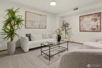 Lower level family/rec room. Has plenty of space for the whole crew.