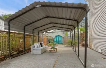 Lots of extra patio space covered for entertaining or extra parking.