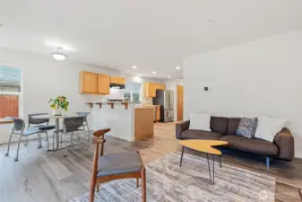 The Welcoming Living Room, Dining Area and Kitchen Flow Seamlessly Together.