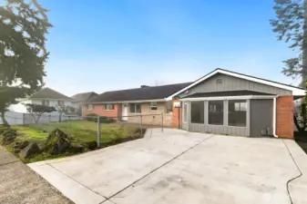 Upper unit parking pad offers plenty of parking.