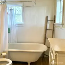 Clawfoot bathtub and shower