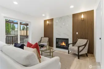 Family room / with wood panels and fireplace