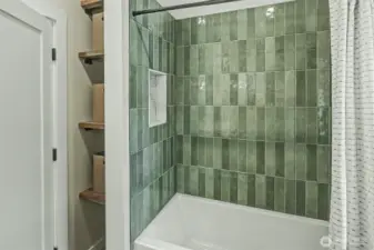 Upstairs bathroom with tub
