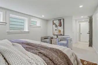 Primary bedroom looking towards the door and walk-in closet.
