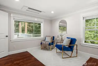 Sitting room overlooking the backyard in the primary