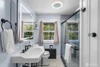 Beautiful updated bathroom in the primary with classic beauty and modern upgrades
