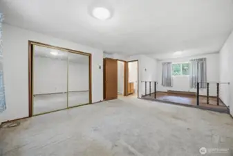 Another view of the primary bedroom with the full bath.