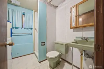 Looking at the 3/4 bath and laundry room which is on the lower level.