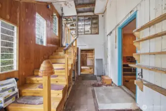 The detached office area is jut to the right opposing the stairs that lead to the (possibly unpermitted) sunroom).