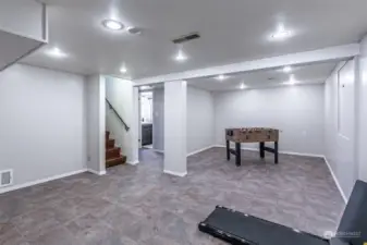 Downstairs rec room. Great space for a work out area/game room/media room.