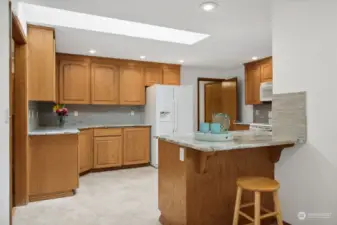 Kitchen with cabinets galore and gorgeous granite counters!