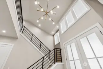 Two Story dramatic entry.  Legrand Q Motion motorized shades, Legrand switches & Decora outlets throughout home w/ lights & dimmers.  Home automation package includes electronic deadbolt, programmable thermostat, smart switches, video doorbell & smart speaker.