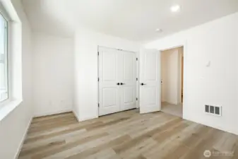 Photos shown are of a similar floor plan previously built in a different neighborhood (The Ridge in Blaine). Finishes and features may vary. Some items pictured reflect buyer-selected upgrades which are not included in the base price and may be added at an additional cost.