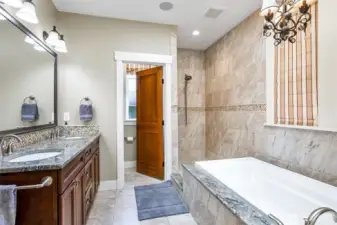 master bath with large soaking tub