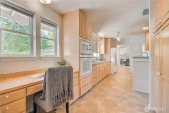 Great desk area has natural light but also offers some privacy away from the kitchen/family/eating area.