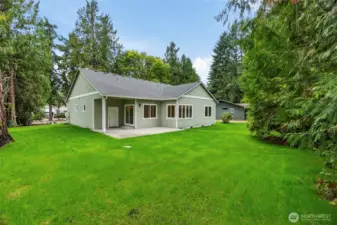 Another shot showcasing the size of this property and lawn!