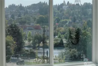 Canal and territorial views from primary bedroom. This view is also found in the living room and on the roof terrace.