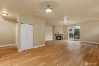 Great room with gas log fireplace.