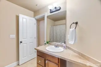 Upstairs "hallway" bathroom is a full bath.