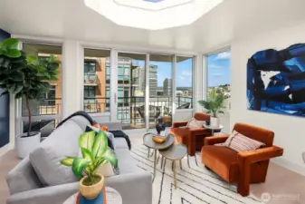 Newer floor-to-ceiling windows and sliding door to balcony