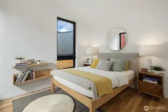 The third bedroom is bathed in natural light, creating a bright and welcoming space.