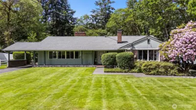 Welcome Home! Behind the classic rambler façade lies a staggering 4500sqft of living space!