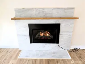 Brand new gas fireplace with fan for addiional heat. #11823 150th St Ct E, Puyallup, WA 98374