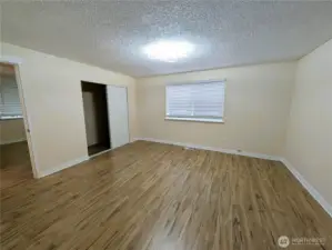 Primary bedroom with new LVP flooring. #11823 150th St Ct E, Puyallup, WA 98374