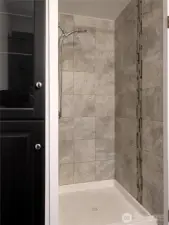 Primary bedroom with tile shower. #11823 150th St Ct E, Puyallup, WA 98374