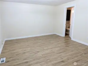 Bedroom 2 with new LVP flooring. #11823 150th St Ct E, Puyallup, WA 98374