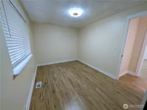 Bedroom 3 with new LVP flooring. #11823 150th St Ct E, Puyallup, WA 98374
