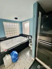 Primary bath with oversized soaking tub.