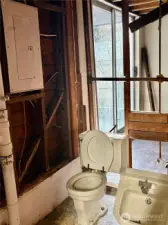 1/2 bath ready for re-do; lower level.