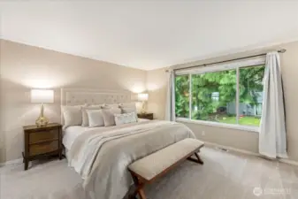The primary bedroom is a relaxing retreat at the end of the day