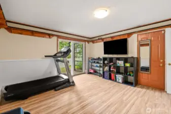 Sliding glass door and door to attached garage.