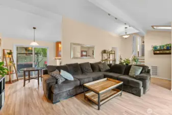 Living room open to dining room.