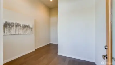 This is the potential room where a business can be done within your own home.  A unfinished half bath and room for a washer and dryer are located on this level.