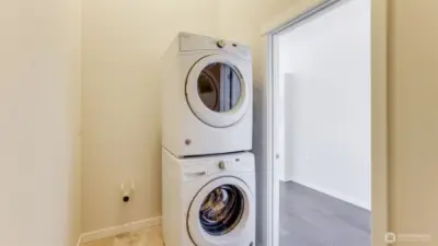 The home's laundry room and future half bath.