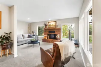 great room with fireplace and access to rear patio